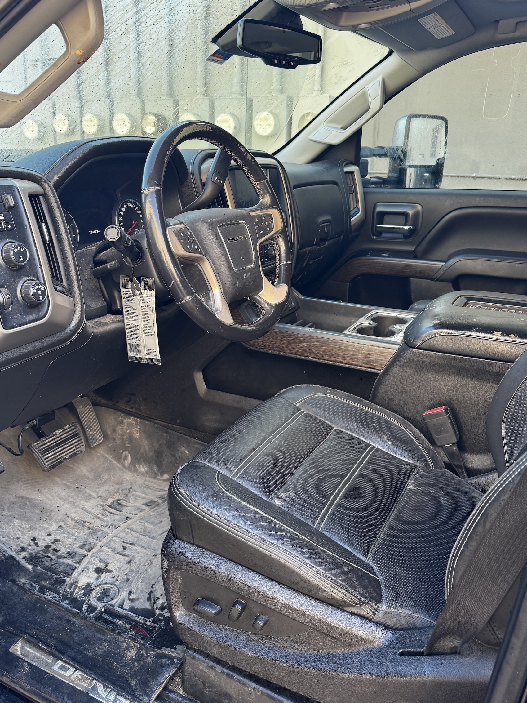 dirty interior of a chevy 3500 denali